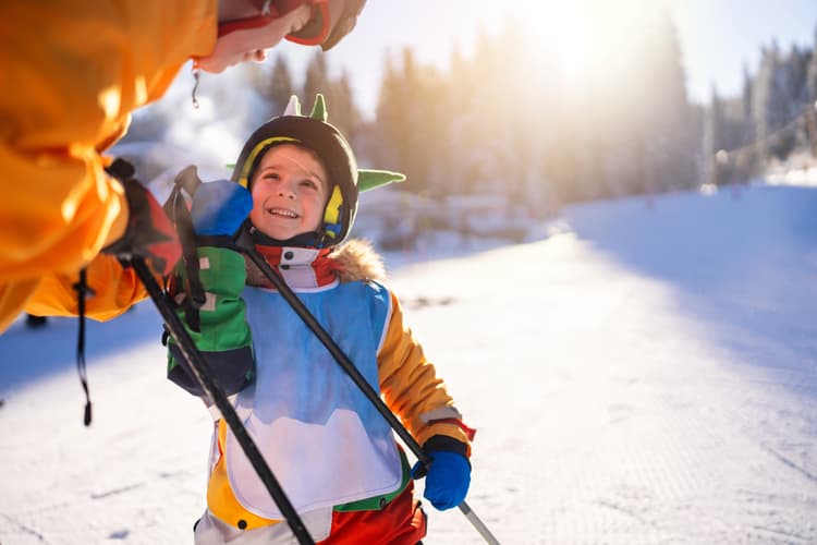 Kid-skiing-bulgaria-smiling-family
